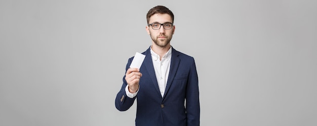 Business concept portrait handsome business man showing name card with smiling confident face white backgroundcopy space