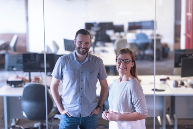 business couple working together on project at modern startup office