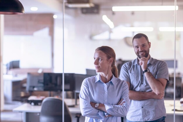 business couple working together on project at modern startup office