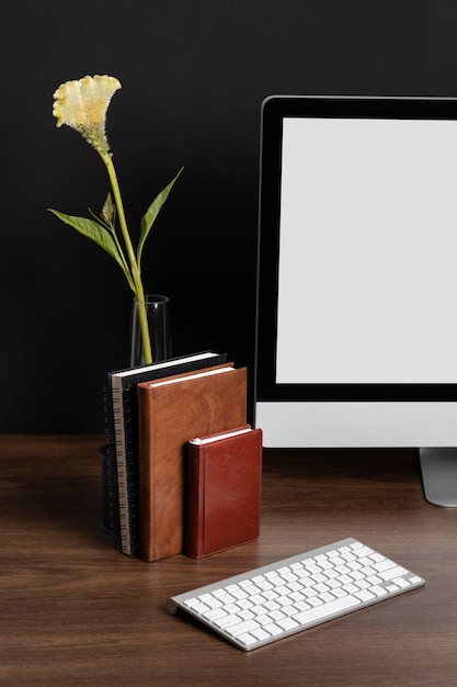 Business desk arrangement with flower