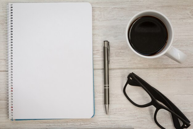 Business desktop objects on a grey table