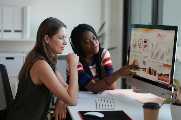 Business discussions Shot of businesswomen brainstorming in an office Two women working at the office