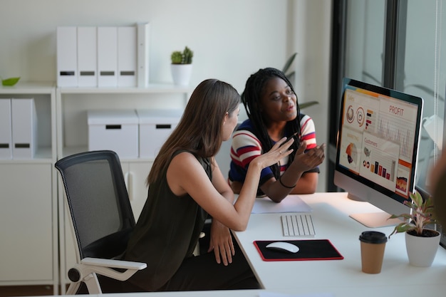 Business discussions Shot of businesswomen brainstorming in an office