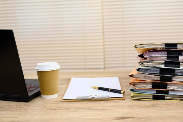 Business documents placed on the office desk