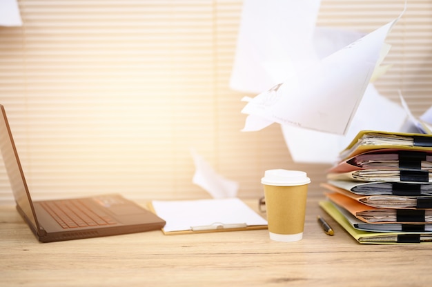 Business documents placed on the office desk