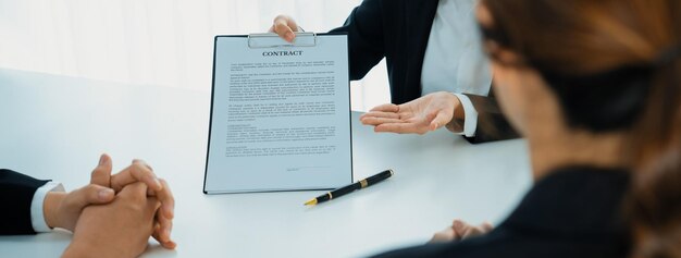 Business executive signing contract agreement document shrewd