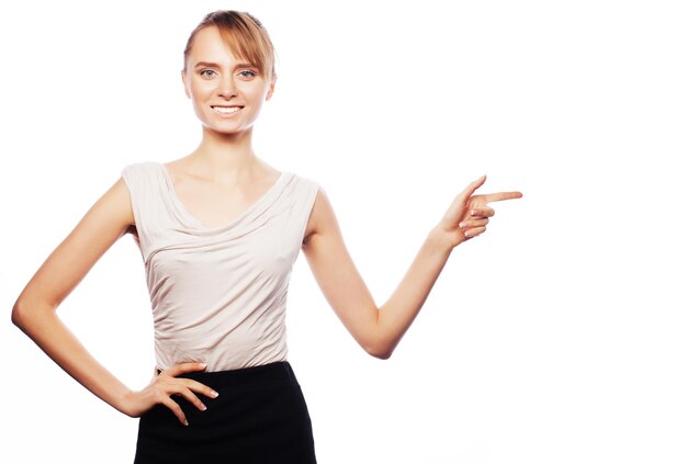 Business, finance and people concept: young business woman show fingers. Studio shot isolated on white.