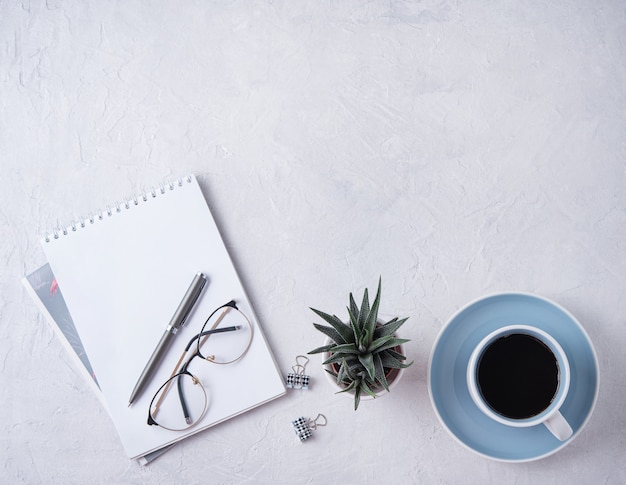 Business flat lay with cup of coffee. Top view