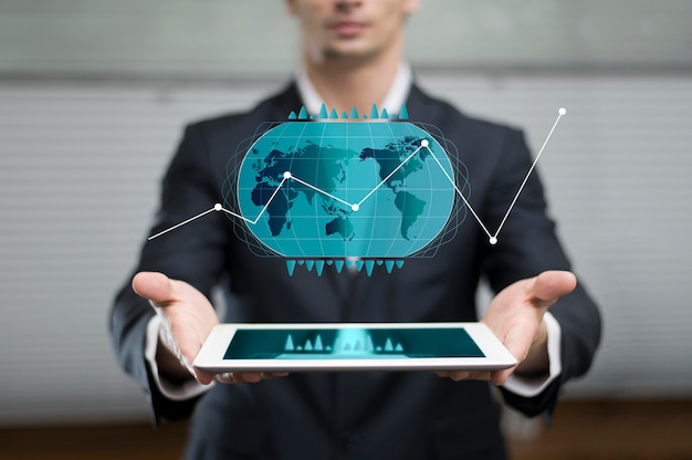business graph in hologram showed by man