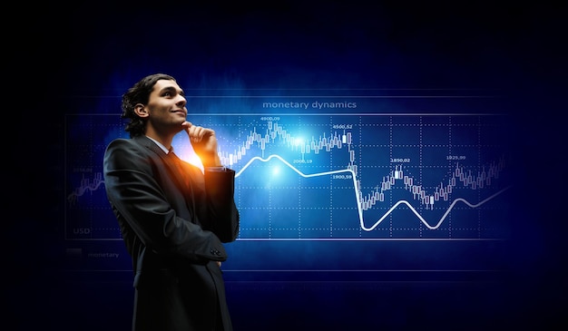 Business graph and trade monitor. Mixed media