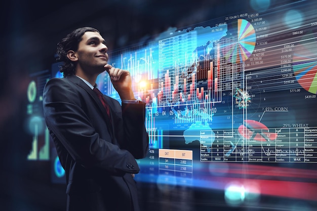 Business graph and trade monitor. Mixed media