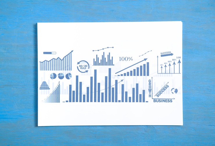 Photo business graphs on blue background