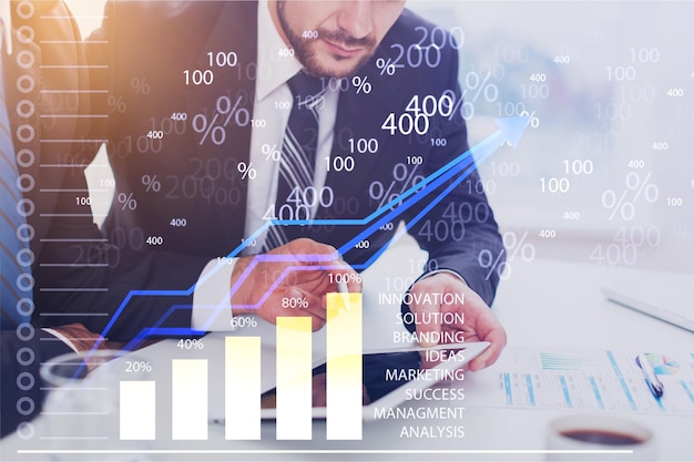 Business growth concept, man in suit and graph