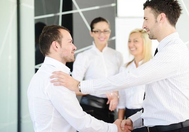 Business handshake after signing new contract