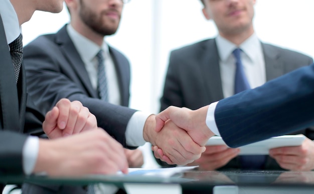 Business handshake and business people concept