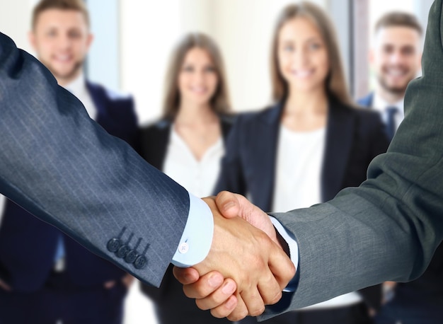 Business handshake and business people