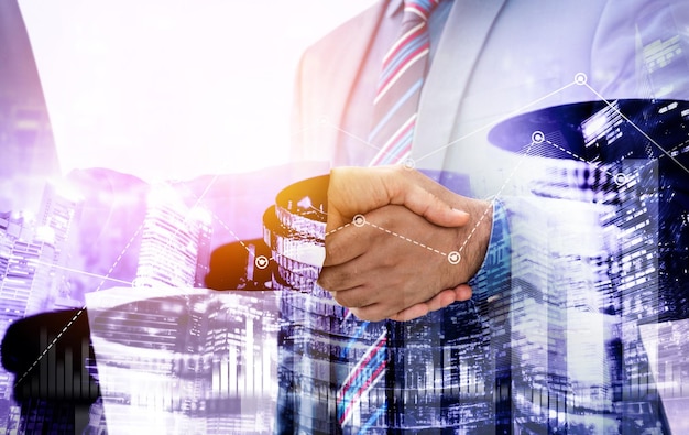 business handshake on finance prosperity and money technology asset background