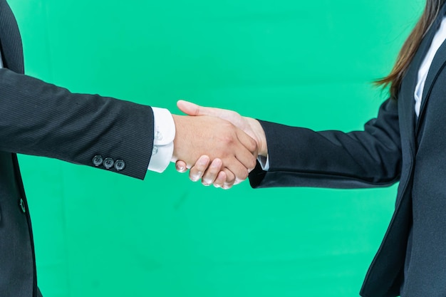 Business handshake on green screen background, partnership trust, respect sign