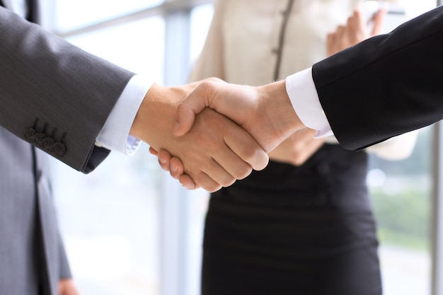 Business handshake in office. Success communication concept