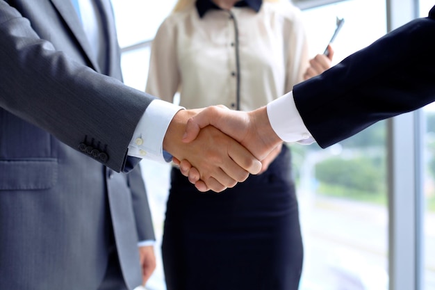 Business handshake in office. Successful communication concept