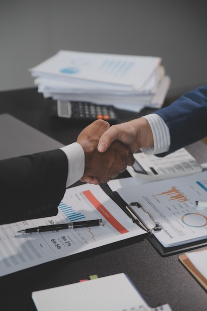 Business handshake for teamwork of business merger and acquisitionsuccessful negotiatehand shaketwo businessman shake hand with partner to celebration partnership and business deal concept