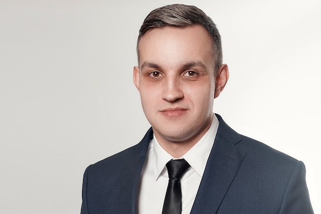 Business, health, people, and lifestyle concept - Portrait of handsome man in black blue suit. dark circles under eyes men. Portrait of concentrated or depressed businessman.