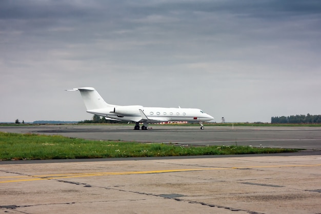 Business jet at the airport apron