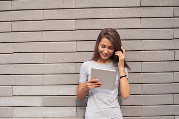 The business lady on the street is engaged in office work