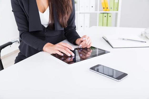 Business lady with gadgets