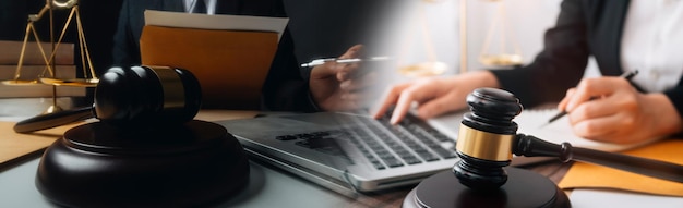 Photo business and lawyers discussing contract papers with brass scale on desk in office law legal services advice justice and law concept picture with film grain effect