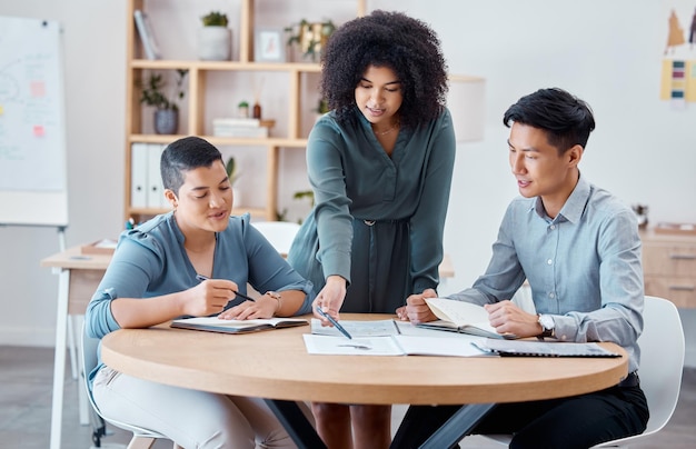 Business leader diversity or teamwork on documents for marketing data review planning or strategy report analysis Startup employees or consulting for KPI target goal target or growth in office