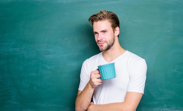 Business lunch student man in class time for rest man at blackboard drink coffee energy and inspiration for education college life school teacher need coffee break good morning back to school