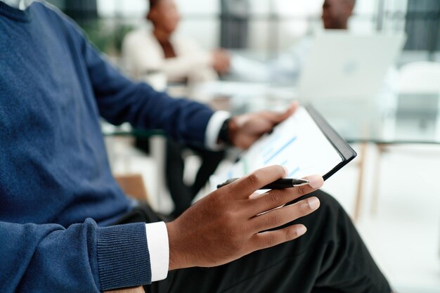 Business man analyzing a financial document  closeup