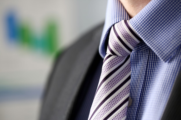 Photo business man in black suit set tie closeup