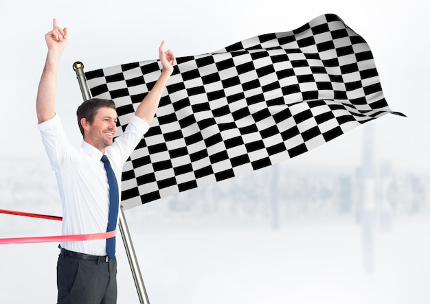 Business man at finish line against white skyline and checkered flag