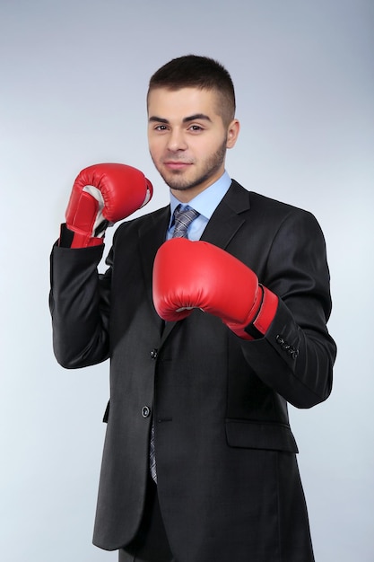 Business man on grey background