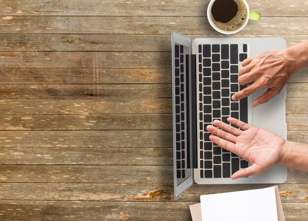 Business man hands using a laptop