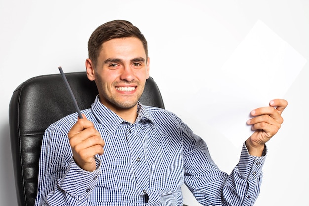 Business man hold the paper and marker at the office on white background