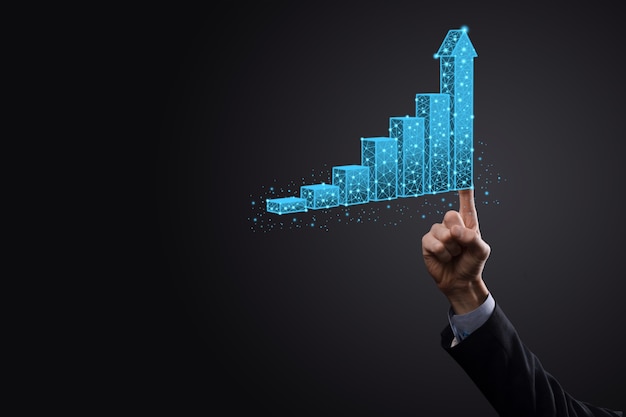 L'uomo d'affari che tiene i grafici 3d a bassa poligonale e le statistiche del mercato azionario guadagnano profitti. concetto di pianificazione della crescita,strategia aziendale.concetto di crescita economica.strategia aziendale. marketing digitale.