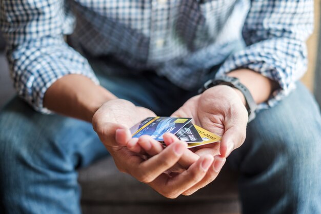 Business man holding credit card, online payment 