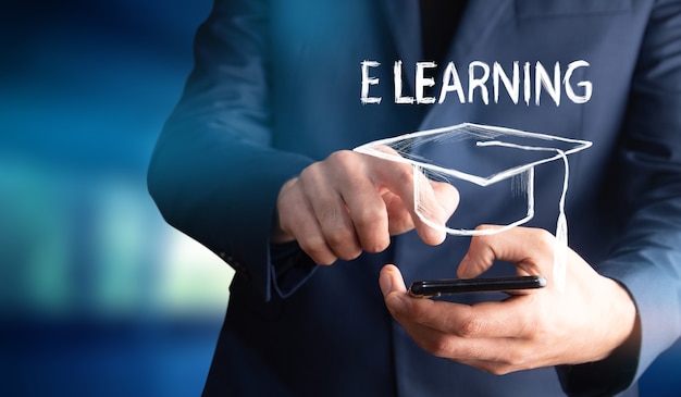 Business man holding phone and "E learning" icon