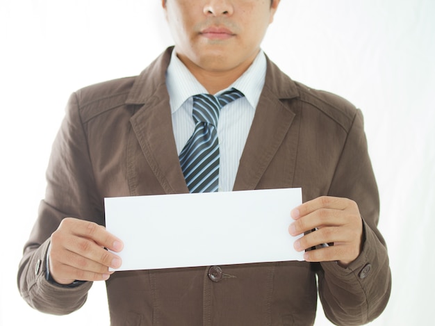 Business man holding white paper on white background,