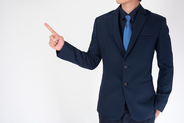 Business man is pointing  on white background 