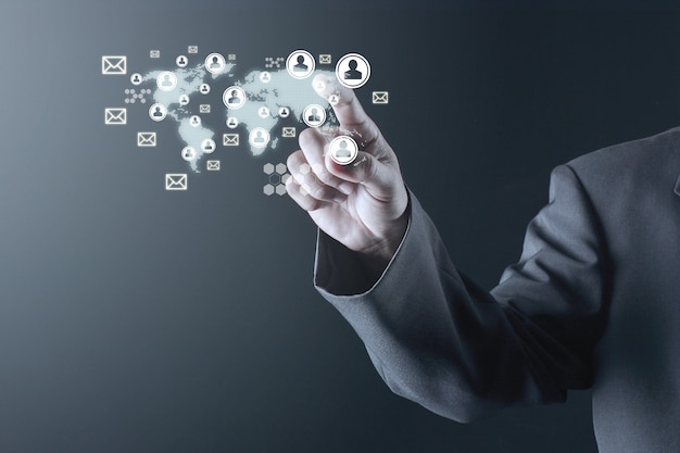 Business man pointing to social media network icons structure