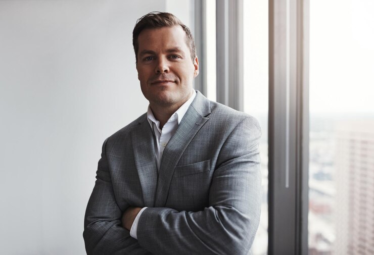 Photo business man and portrait with confidence in office arms crossed and pride for corporate company professional career and male employee as hr manager for admin tasks job and management by window