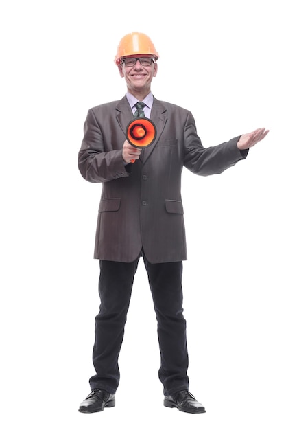 Business man in a protective helmet with a megaphone. isolated on a white background.