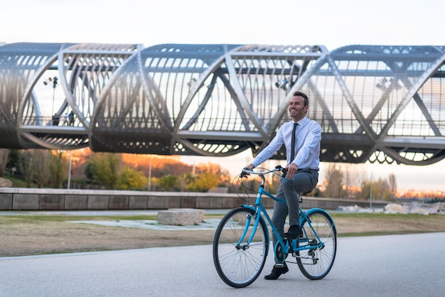 Business man riding a vintage bicycle in the cityxA