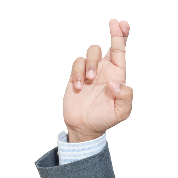 Business man's finger crossed hand sign isolated on white