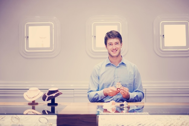 Business man selling in jewelry store