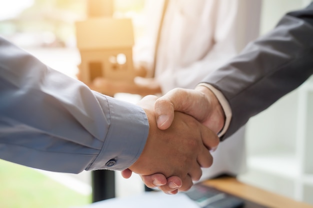 Business man shaking hands during a meeting in the office